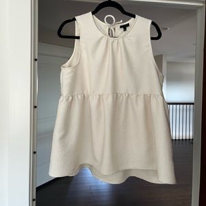 Who what wear babydoll sleeveless top in white. Double tie in back